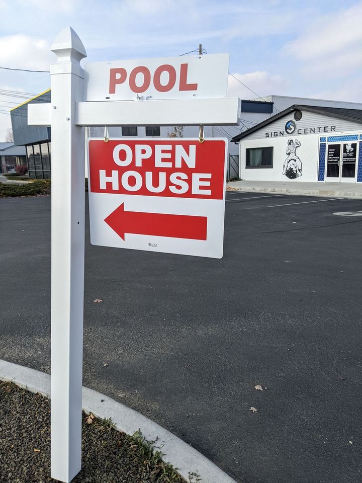 Open house sign and pool rider on a yard arm at The Sign Center in Boise