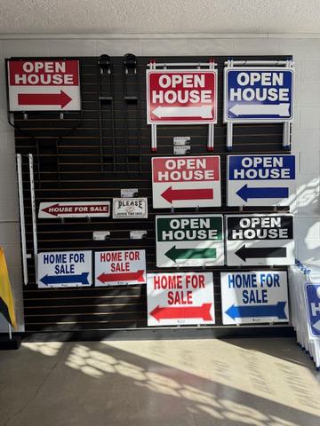 Open house and Home For Sale directional signs in The Sign Center showroom