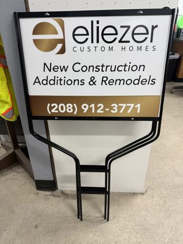 Eliezer Custom Homes builder sign on a wire stand